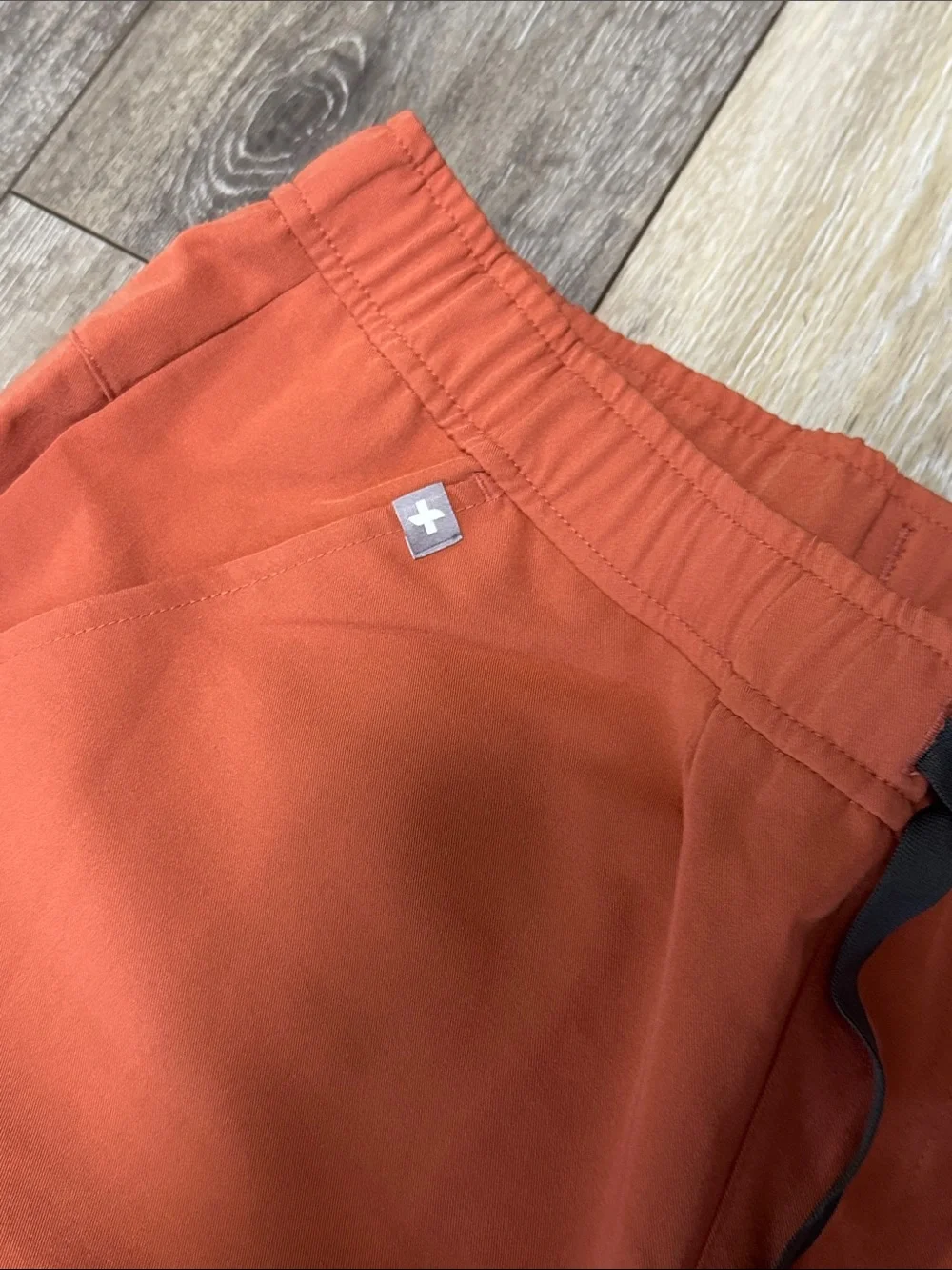 Figs Men's Burnt Orange Jogger style scrub pants with Black Drawstring